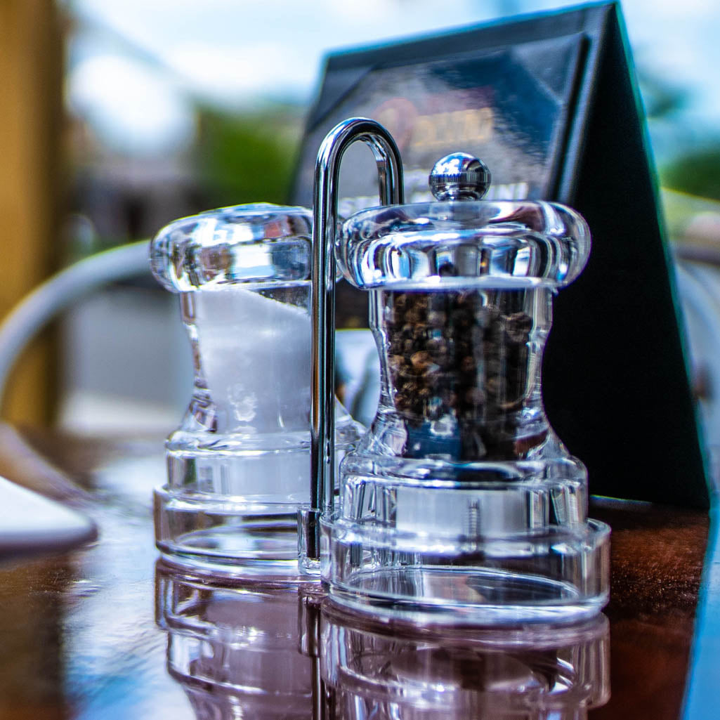 01630 4 Inch Capstan Acrylic Pepper Mill & Salt Shaker with Rack, Table View