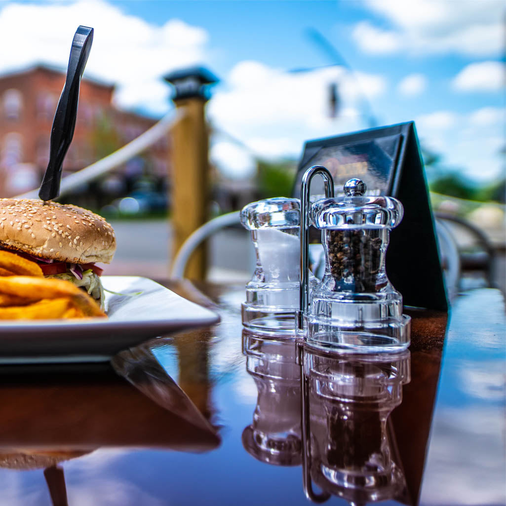01630 4 Inch Capstan Acrylic Pepper Mill & Salt Shaker with Rack, Table View